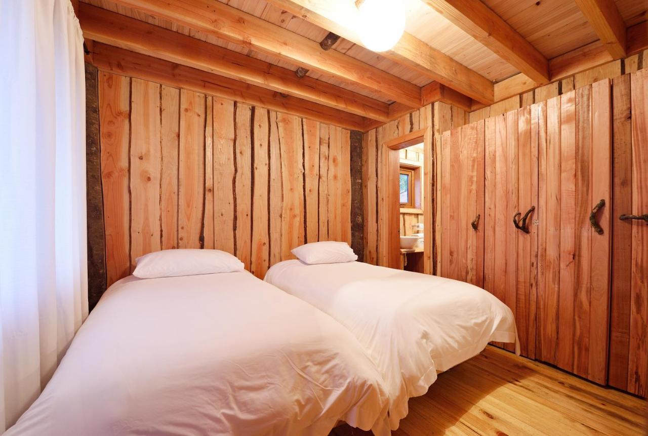 Huilo Huilo Cabanas Del Bosque Puerto Fuy Kamer foto